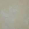 Papier peint texturé beige et saumon avec un motif d'effet béton de la collection Savana