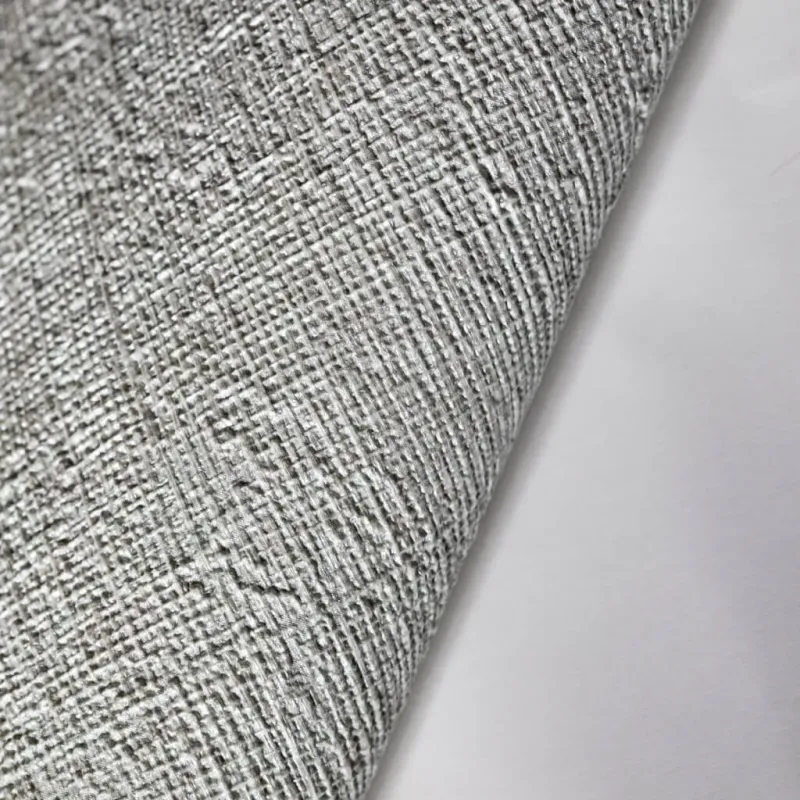Papier peint en fibre intissée moderne uni à texture lin dans des tons vert menthe clair et gris clair