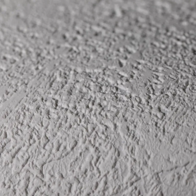 Modern non-woven wallpaper with subtle texture and abstract distressed look in light beige/off-white tones