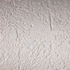 Papier peint en fibre intissée moderne à texture légère et aspect vieilli abstrait dans des tons crème/beige