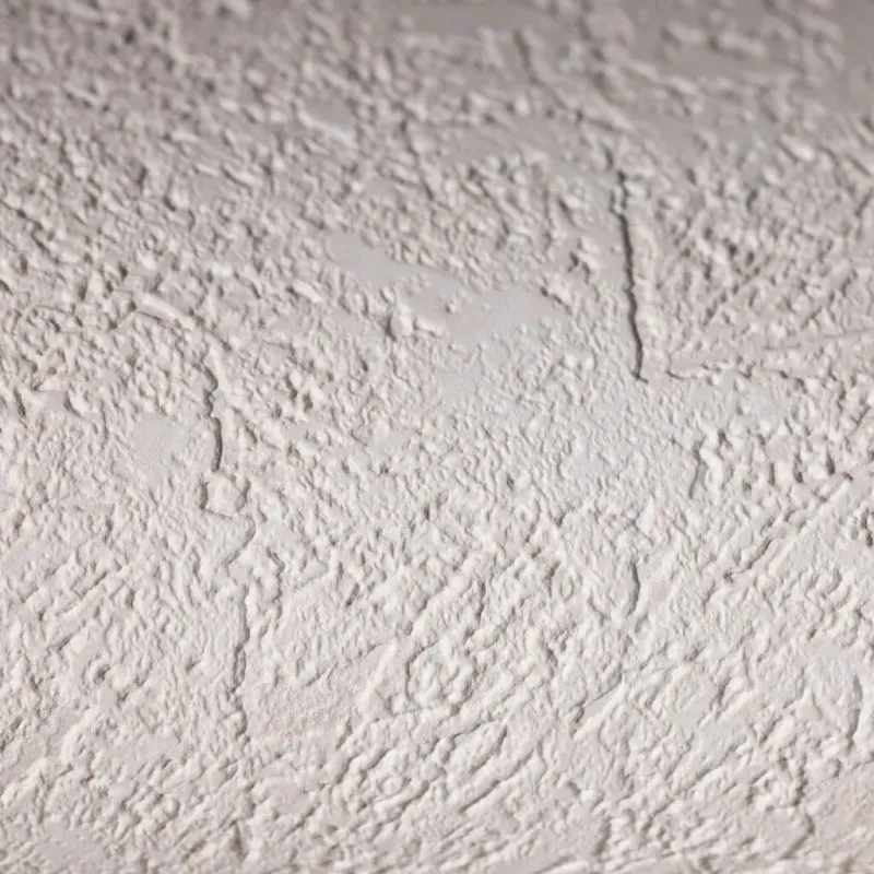 Papier peint en fibre intissée moderne à texture légère et aspect vieilli abstrait dans des tons crème/beige